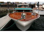 The 'Bullnose' bow of the Chris Craft Constellation is very evident in this photo which also shows the colour coded mooring line!